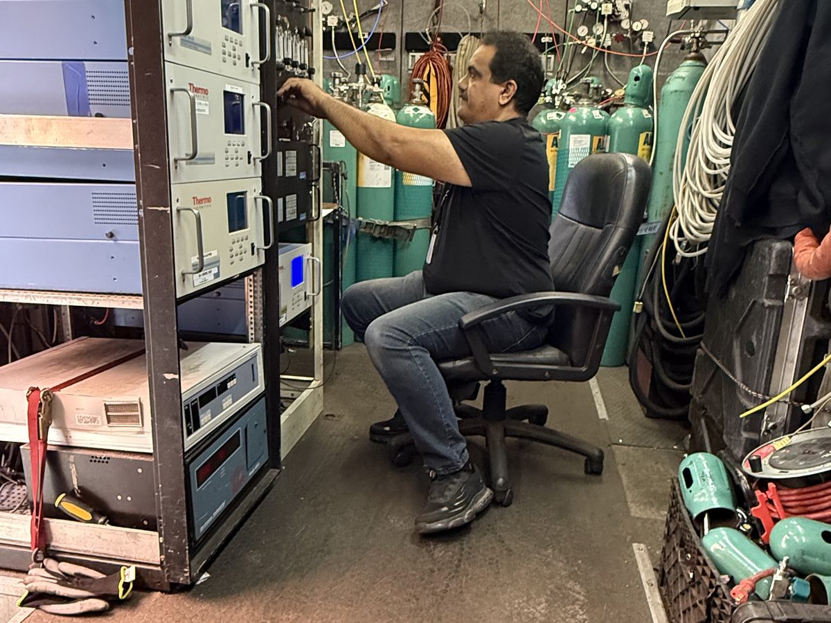 Interior of the AccuEnviro mobile testing laboratory with continuous gas analyzers