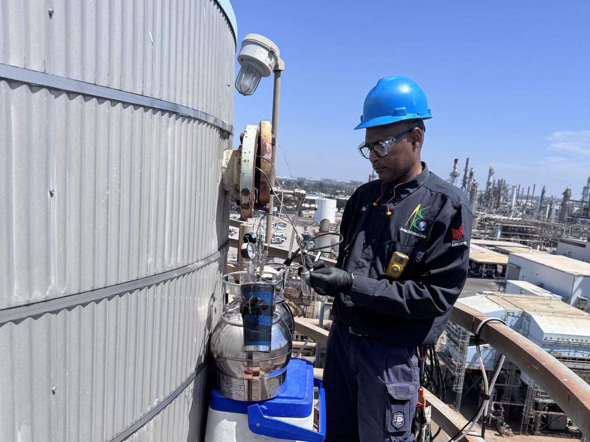AccuEnviro technician performing source testing at a Southern California refinery